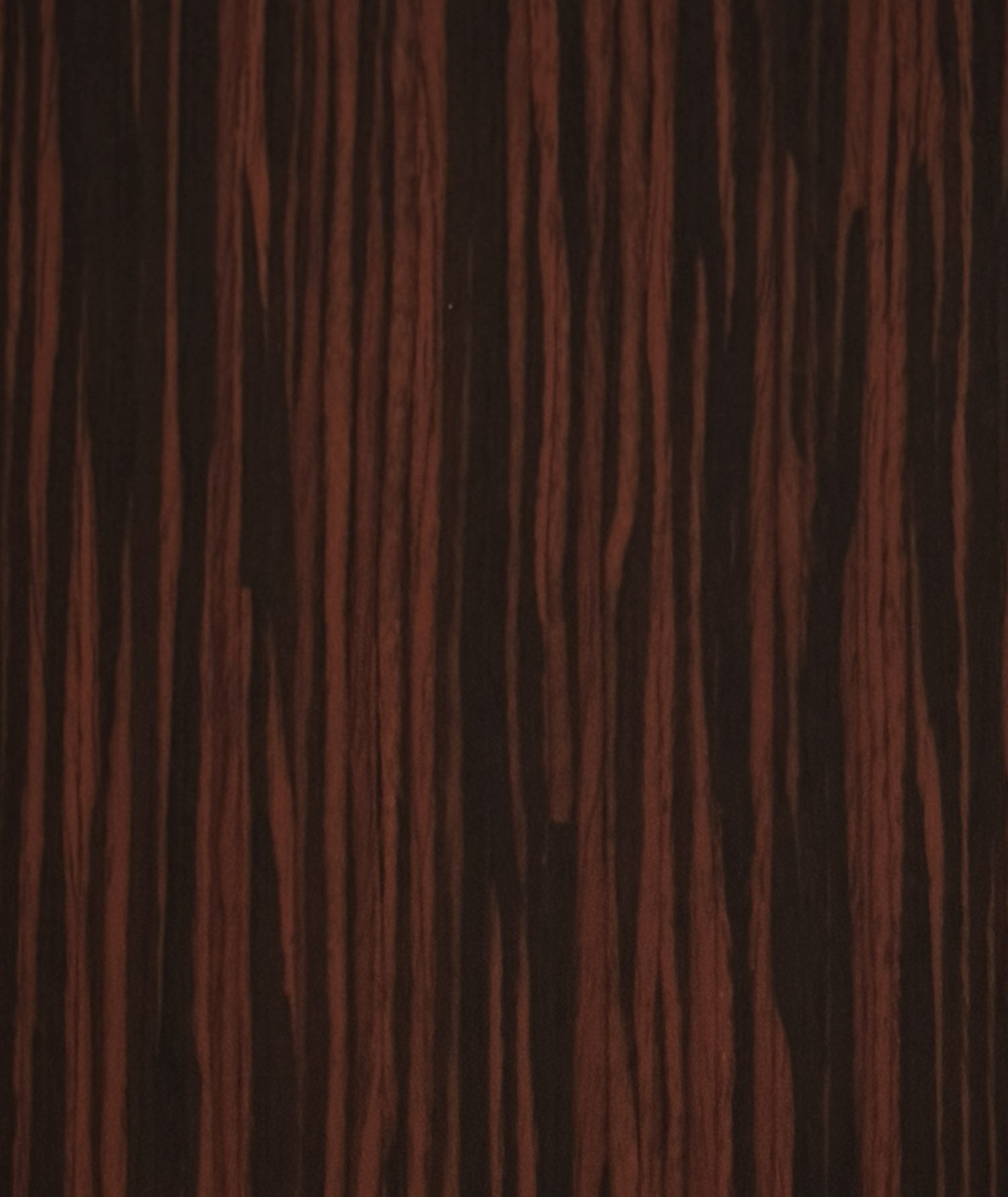 Close-up of a dark brown wood grain texture